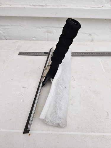 Window cleaning squeegee and - window,